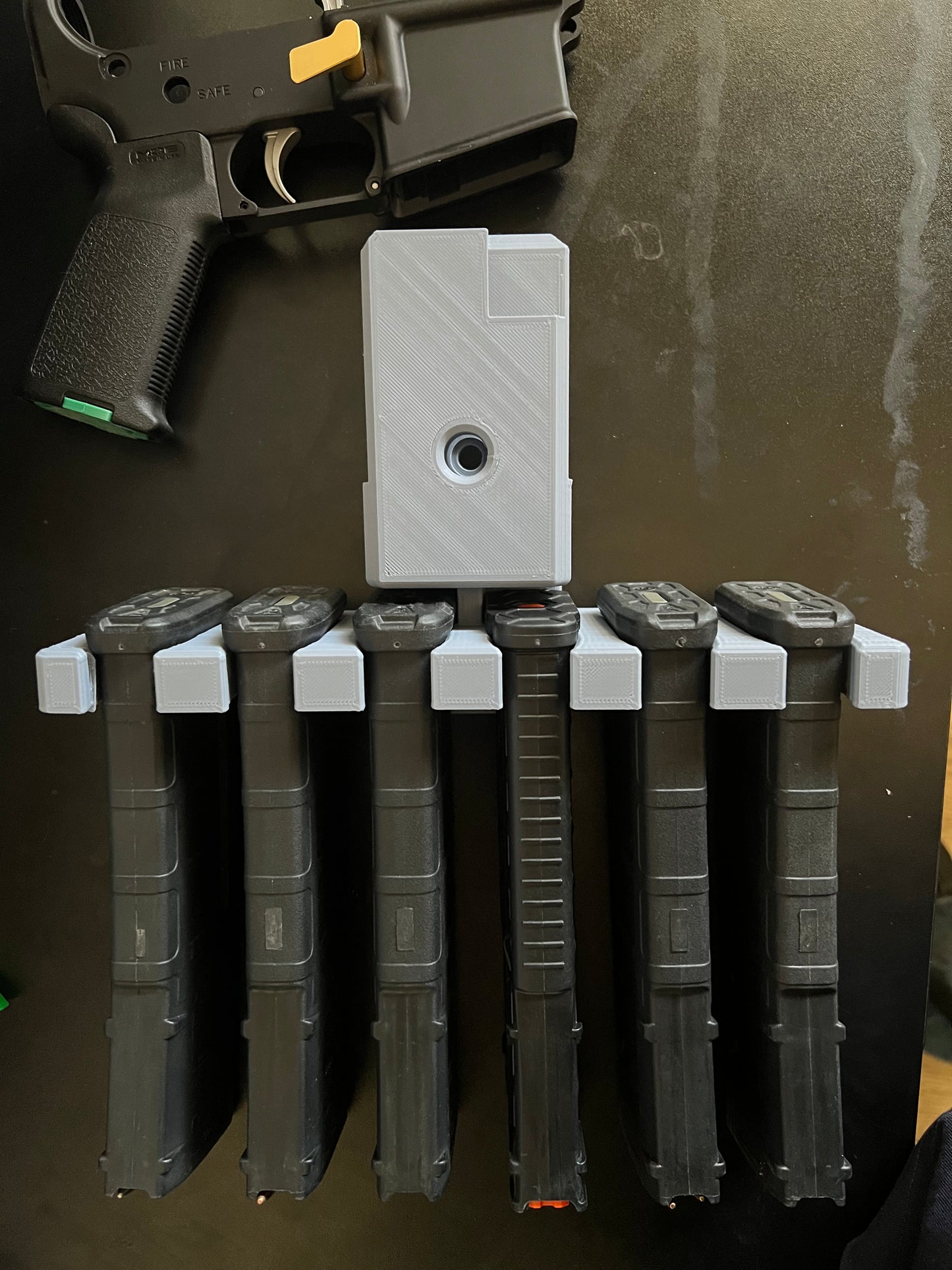 .1 - Introducing the Ultimate AR-15 Wall Mount with Integrated Magazine Holder!